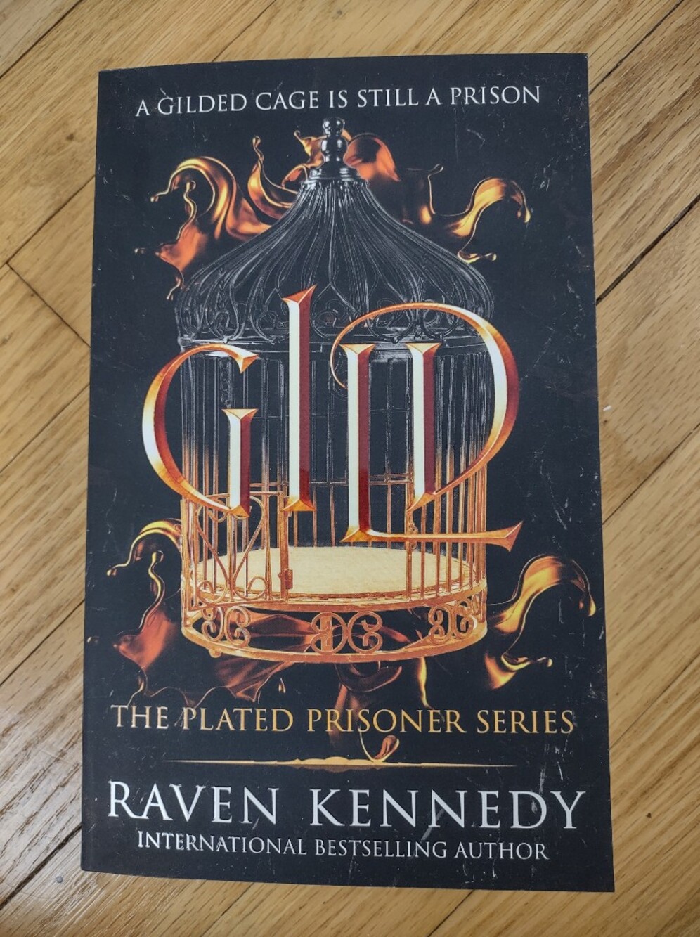 Raven Kennedy "Gilded Cage" Paperback Book